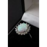Substantial silver, cz and opal ring