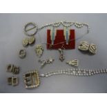 Nine Vintage Buckles and Art Deco Clips including French and Paste Necklace, Bracelet and Earrings