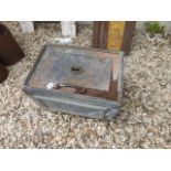 A vintage metal /iron safe with carrying handles no key