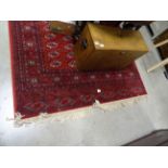 A large red ground rug