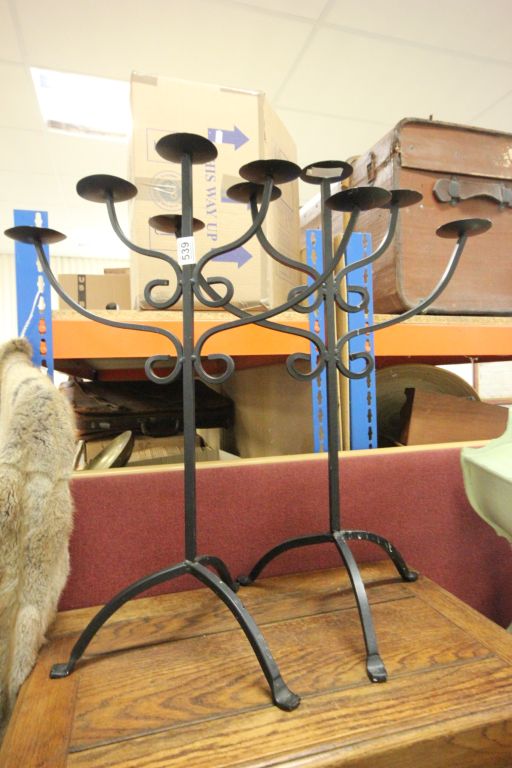 Two black painted 5 pricket candle holders