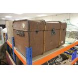 Large invincible leather and wood bound travelling trunk with selection of fabrics, Indian Sari,