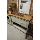 Kitchen work table with deep drawer & pot shelf below