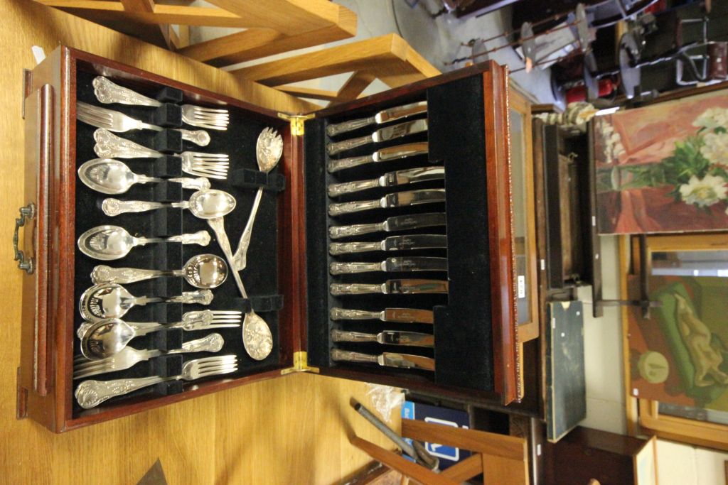 Silver plate canteen cutlery in large wooden display case