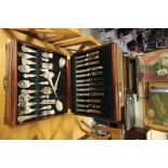 Silver plate canteen cutlery in large wooden display case