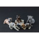 Four Royal Copenhagen Models of Dogs, all with gold stamps - 748, 750, 743 and 749 plus a Koala Bear