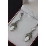 A pair of silver, marcasite and opal Art Nouveau style drop earrings