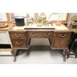 Early 20th century Walnut Queen Anne Style Desk with three leatherette inset panels