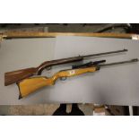 A vintage Webley Hawk break barrel air rifle and a similar BSA air cadet air rifle.