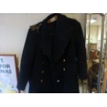A vintage naval great coat with buttons.