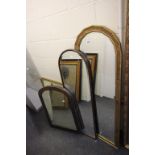 two antique beveled edged mirrors of narrow form and one other.