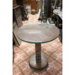 Pedestal table on circular support with separate glazed top together with Metal floor standing