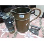 Copper jug, hunting horn, miners lamp with electric fitting and an iron