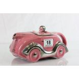 Pink ceramic Art Deco car teapot with number plate OKT42 and registration number to base