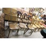 A set of three antique hoopback kitchen chairs.