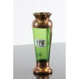 Iridescent green glass vase with copper overlay