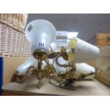 Pair of three branch brass ceiling lights with opaline glass shades plus two other light fittings,