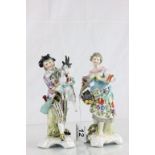 Pair of 19th century ceramic figures depicting man with a goat in his arms and a woman with a basket