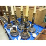 Group of eight wooden lamp bases fitted for electric