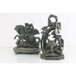 Two vintage cast iron door stops to include; George & Dragon and Hunting theme