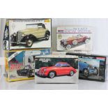 Six boxed model road vehicle kits all are unassembled and appear to be complete, including three