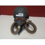 Gaming console storage helmet figure (?)