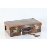 Vintage leather case with brass locks and a fitted interior