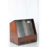 Mahogany shop cigar display cabinet with sliding glazed panels to front over a drawer