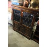 Mid 20th century Oak Side Cabinet with Leaded Glazed Doors over Cupboard