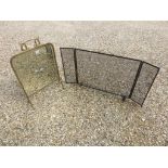 A three fold fire guard and a mirrored fire screen with beveled edge.