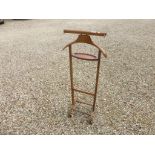 A 20th century beech valet stand.