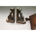 Carved pair of wooden shelf brackets and a mahogany pot stand