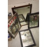 Three vintage pub advertising mirrors.