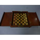 Mahogany cased 19th Century travelling Chess set with bone pieces