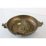 Heavy cast bronze bowl with female figure in relief to centre, marked to reverse "Maecdes Prung am