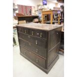 An antique oak 18th century chest of drawers two short over three long drawers with paneled sides