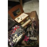 A large quantity of mainly costume jewellery a jewellery cabinet and box.