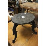 An Anglo Indian carved ebony stool