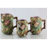 A set of three late 19th century Majolica jugs