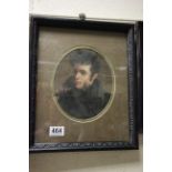 An ebonised framed oval oil painting of a 19th century learned gentleman