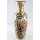 A contemporary oriental style floral decorated vase.