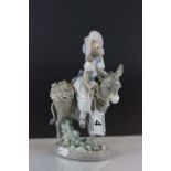 Lladro figurine of a girl riding a donkey 5465