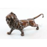 Cast bronze figure of a lion