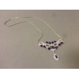 A fine silver, cz and amethyst necklace