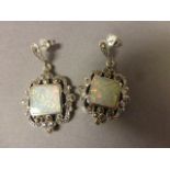 Pair of silver, marcasite and opal paneled earrings