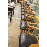 Set of Twelve Late Victorian / Edwardian Tub Captains Club Chairs with roll over backs, stuffed