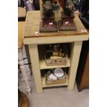 A painted oak kitchen work stand with herb chopping block