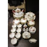 A large quantity of Royal Albert Country Roses china to include teapot, cups and saucers, plates ,