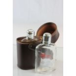 Leather cased pair of glass spirit flasks with white metal screw tops