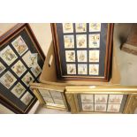 Eight framed and glazed prints of assorted cigarette and collectors cards including: Eastern